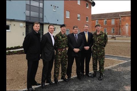 Joining forces: senior managers of the Allenby/Connaught team outside Aspire’s 100th new top-rated accommodation block.